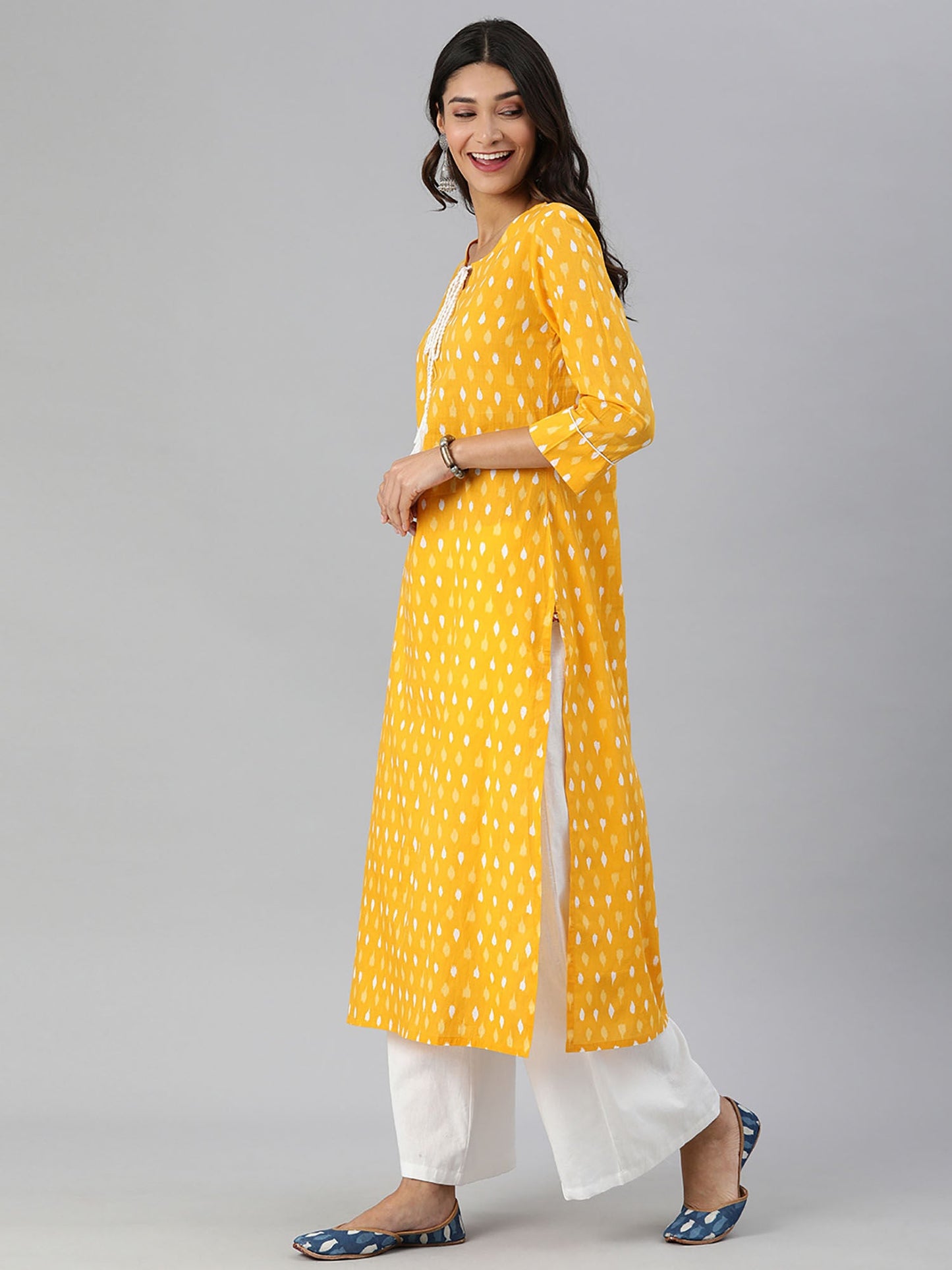 KSUT Mustard & White Ikat Printed Straight Kurta, Dori & Tassel Detailing On Neckline
